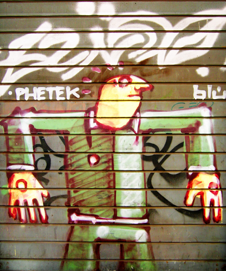 Street Art – Banksy & Co. Blu. Phetek. Spray su serranda d’acciaio, cm 280×226. Collezione privata